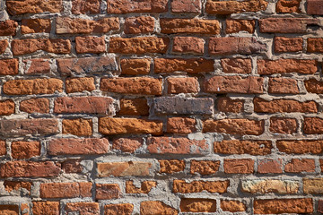 Texture of an old brick wall. Old red brick masonry. The brick background.
