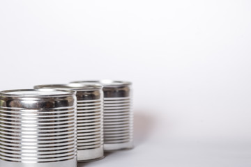 Metal cans on a white with copy space