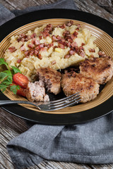 Minced meat cutlets with boiled sauerkraut.