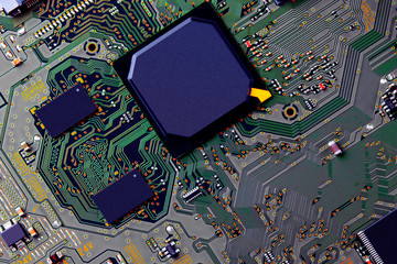 Electronic circuit board close up.