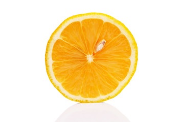 Half a bright juicy lemon. Healthy eating and vegetarianism. Vitamins during the coronavirus pandemic. Isolated on a white background. Close-up.