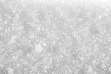 Light sugar sprinkled background at high magnification