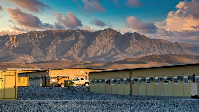 A field camp during the ISAF mission in Afghanistan in front of mountains in Mazar E Sharif.