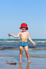 Little boy at sea shore