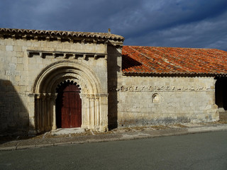 Fototapeta premium Door of the Chapelle of San Galindo and wall calender. Medieval Romanesque Church of Campisabalos (13 Century). Guadalajara. Spain.