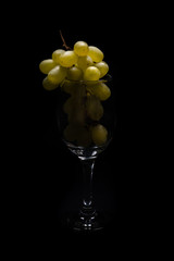 bunches of grapes in the glass