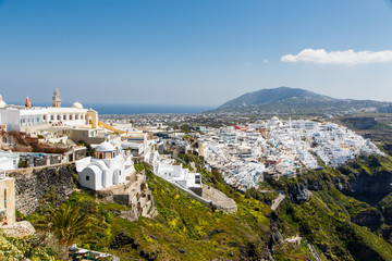 Naklejka premium Beautiful view of famous romantic white town in Santorini Island, Greece
