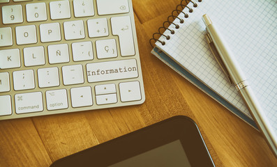 Keyboard with information button. Concept for any illustration of teleworking or teleworking and home workers