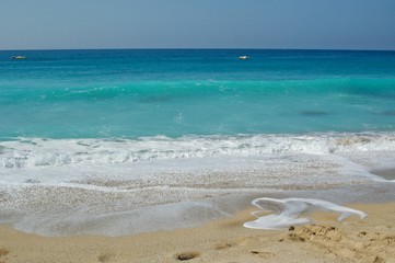 Scenic View Of Sea Against Clear Sky.