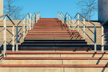 high and vertical staircase with metal rails to the heaven. challenge concept