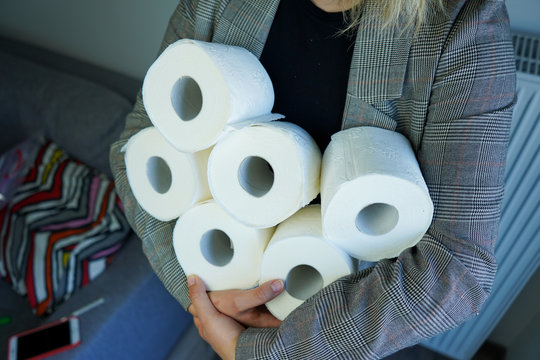 People are stocking up toilet paper for home quarantine from coronavirus.