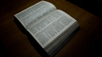 Fototapeta premium This is a Malayalam and English dictionary. It is a picture taken from the top side. A light drop makes this image even more beautiful. Those who need it can modify the style of a book. 
