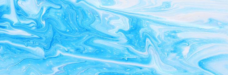art photography of abstract marbleized effect background. Blue and white creative colors. Beautiful paint