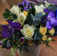 
A bouquet of flowers is in a vase. View from above