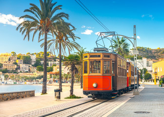 The famous orange tram runs from Soller to Port de Soller, Mallorca, Spain  © proslgn