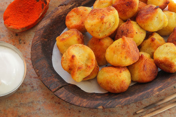 
dumplings, ravioli, fried with spices and sauce.