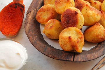 
dumplings, ravioli, fried with spices and sauce.