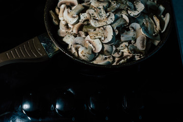 Roast the mushrooms in an old dirty frying pan