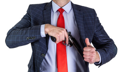 A man pulls out a revolver from his jacket. A bodyguard with a gun.