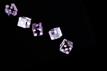 Purple Casino dices over black background