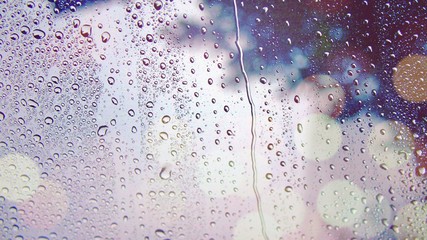 Waterdrop on the glass of window on raining season