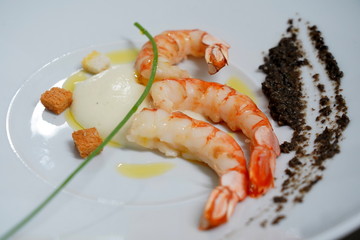 king prawns on a plate, a dish from a restaurant. shrimp. Tiger prawns
