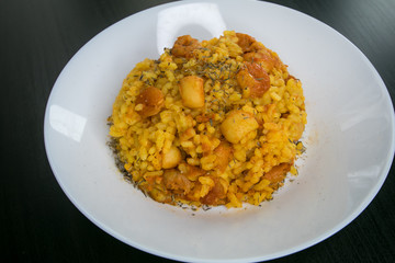 Traditional Valencian meal Arroz a banda with seafood