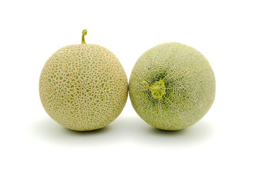 Close up fresh Japanese honey melon cantaloupe with short stalk. Organic fruit for good health and nutrition, ingredient for eat with salad, isolated on white background.