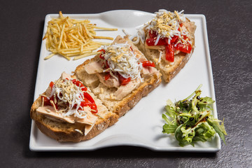 Tasty open sandwich or toast with tuna