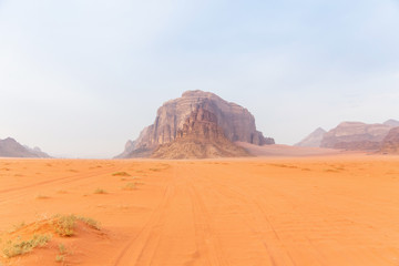 Fototapeta na wymiar Sand-dunes and rocks in Wadi-Rum desert, Jordan, Middle East