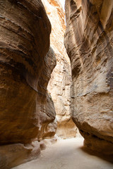 The Siq, the narrow slot-canyon that serves as the entrance passage to the hidden city of Petra. This is an UNESCO World Heritage Site