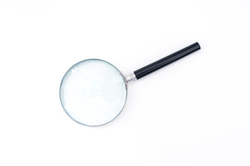 Black handle and metal rim Magnifying glass on a white background