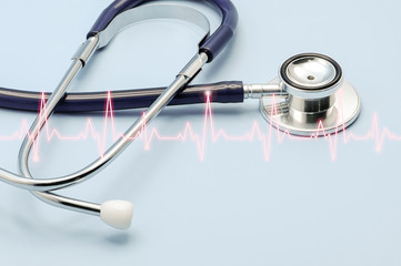 Double exposure of medical stethoscope and cardiogram isolated on light blue. Cardiac therapeutics assistance, pulse beat measure, arrhythmia pacemaker medical healthcare concept with copy space.