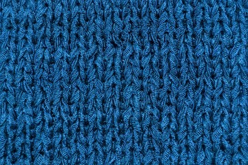 Knitted texture saturated dark blue. Background template for design banner, poster, wallpaper. Saturated blue backgroundHigh quality photo