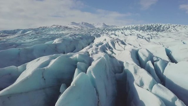 Aerial view. Close up of Largest Glacier in the world.
Antarctica Melting Blue Iceberg Aerial View. Arctic Ice Nature Landscape of Global Warming and Climate Change Concept Top Drone Shot Footage 4K 