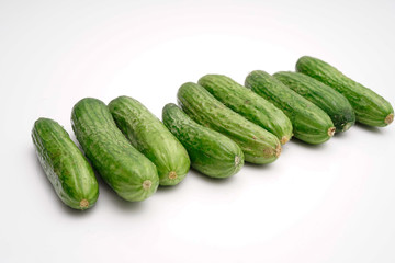 crunchy mini cucumber on white isolated background