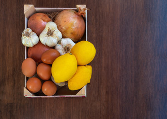 overhead view of box with assorted vegetables