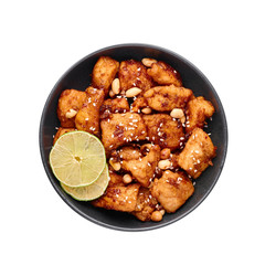 Korean Sweet Fried Chicken Dakgangjeong in black bowl isolated on white background. Dakgangjeong is korean cuisine dish with deep fried crunchy chicken in sweet sauce. Korean Food