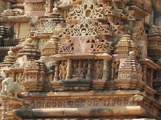 Fototapeta premium Erotic Human Sculptures at Vishvanatha Temple, Western temples of Khajuraho, Madhya Pradesh, India. Built around 1050, Khajuraho is UNESCO World heritage site and is tourist destination for erotica.