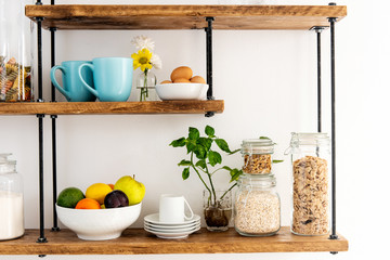 glass jars with cereals on shelves