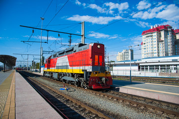 Fototapeta na wymiar The locomotive of the train arrives at the station