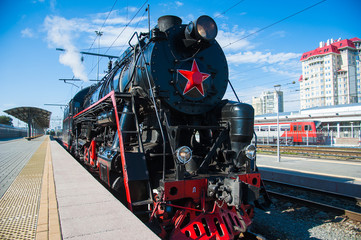 Vintage black steam locomotive. The train arrived at the station