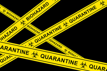 Yellow barricade tape with different warnings about COVID-19 quarantine