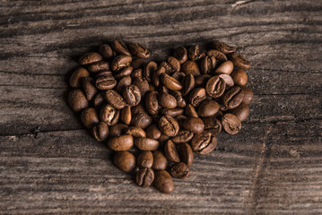 heart made from coffee beans on the table