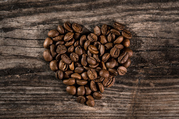 heart made from coffee beans on the table
