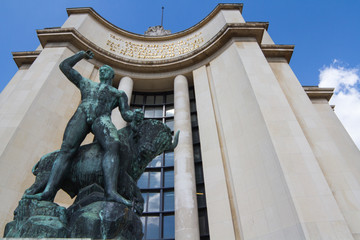 PARIS, FRANCE - 04 April 2014: Bronze statue of Hercules and the buffalo bull Trocadero by (Albert Pommier) le palais de chaillot Paris, France