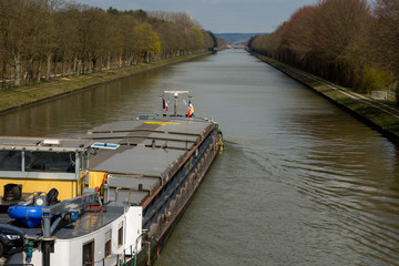 Fototapeta premium cargo ship in the ems-canal, germany