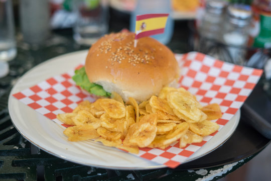Close-up of hambuguersa with chips in restaurant