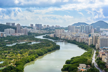 Fototapeta premium Beautiful aerial panoramic view of the city of Sanya city from Luhuitou Park. Hainan, China.