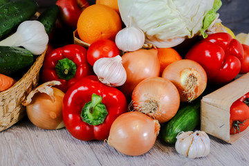 Close-up on a background of light countertops onion turnip, garlic, red pepper.